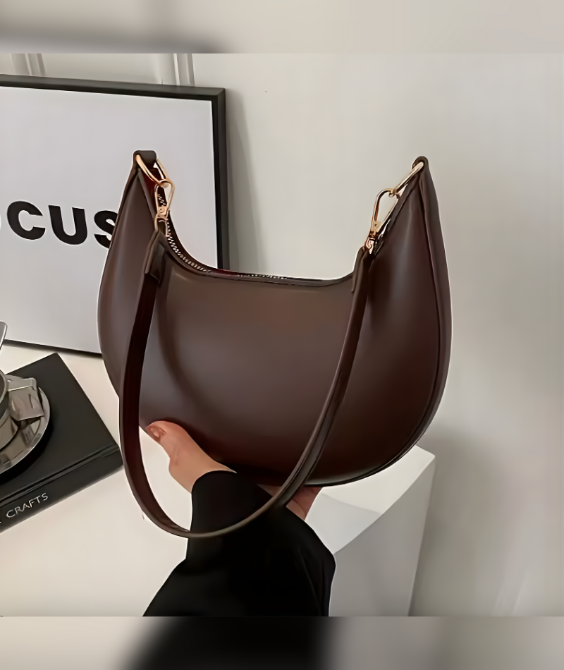 Bolso semicircular con correa – Liora