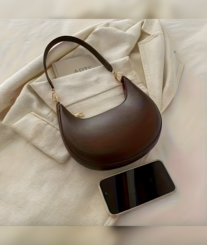 Bolso semicircular con correa – Liora